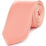 El toque de elegancia: Análisis de corbatas color salmón en la moda masculina